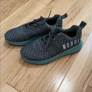 NOBULL women’s Charcoal and Aqua trail shoes